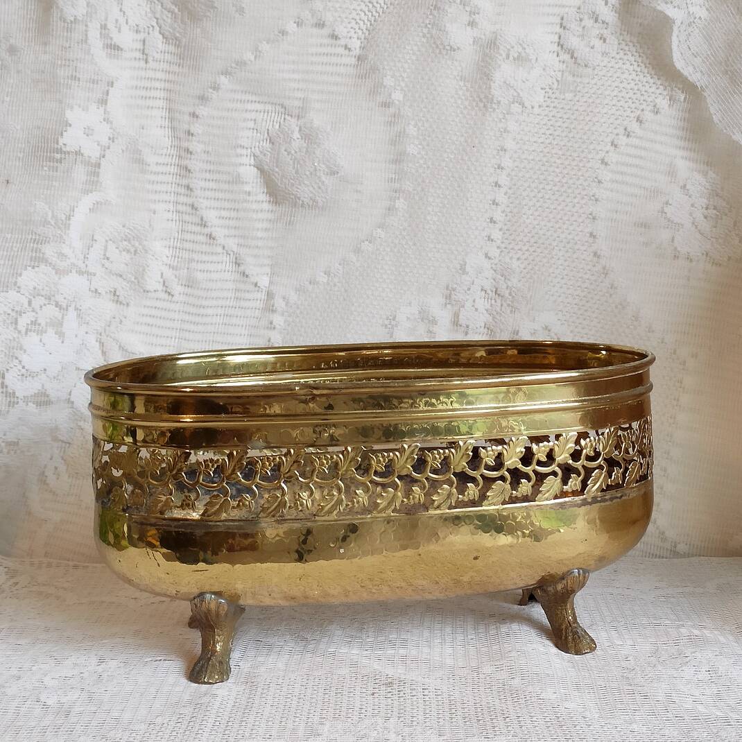 Old golden metal planter