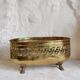 Old golden metal planter