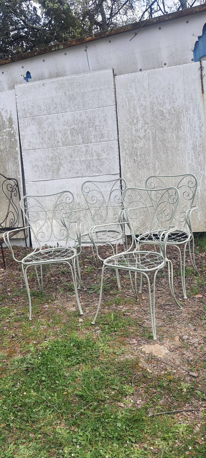 4 wrought iron chairs