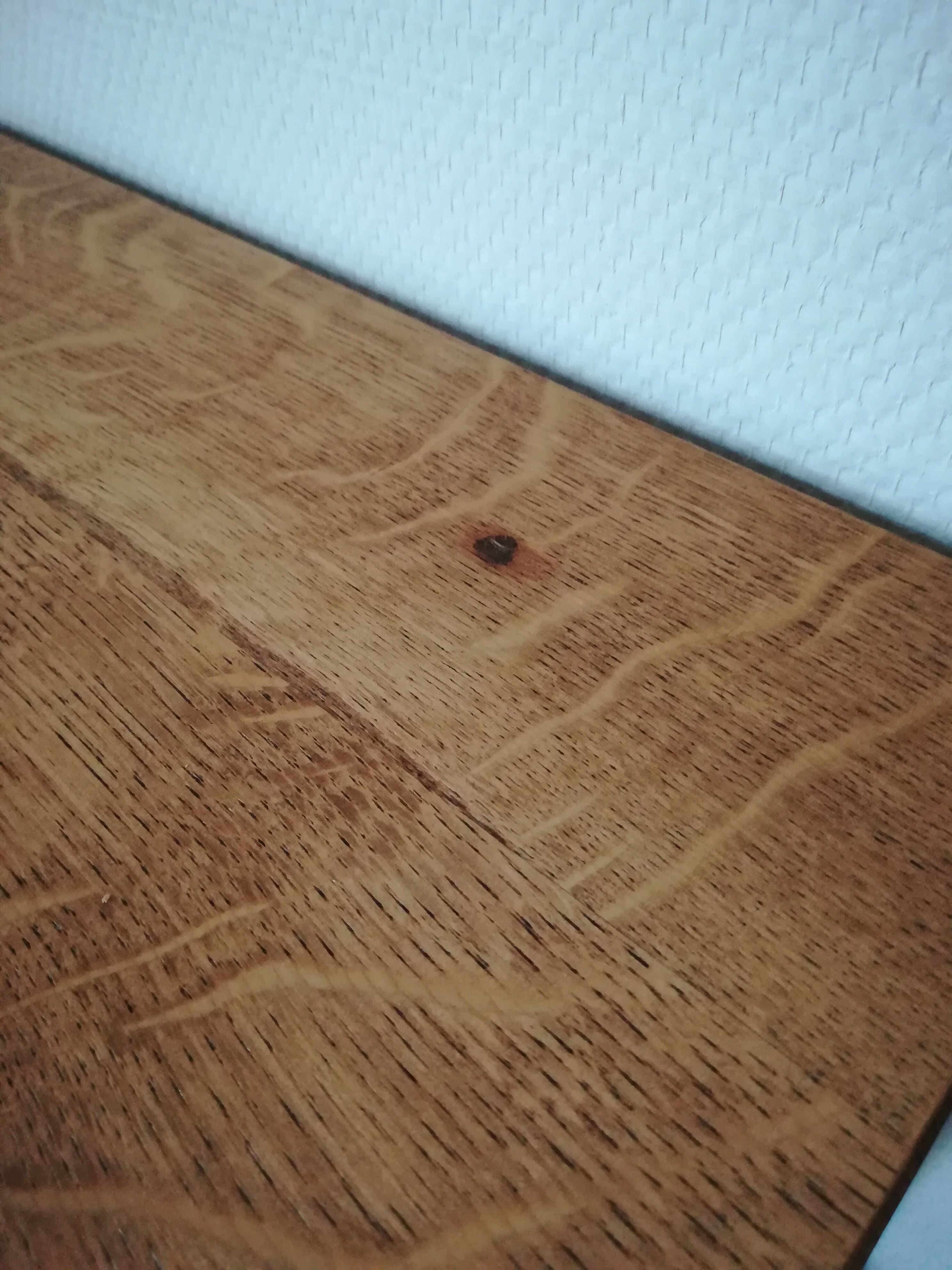 A pair of bedside tables