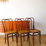 Set of 3 bistro chairs in wood and canework signed J. Kohn, Made in Austria, 20th century