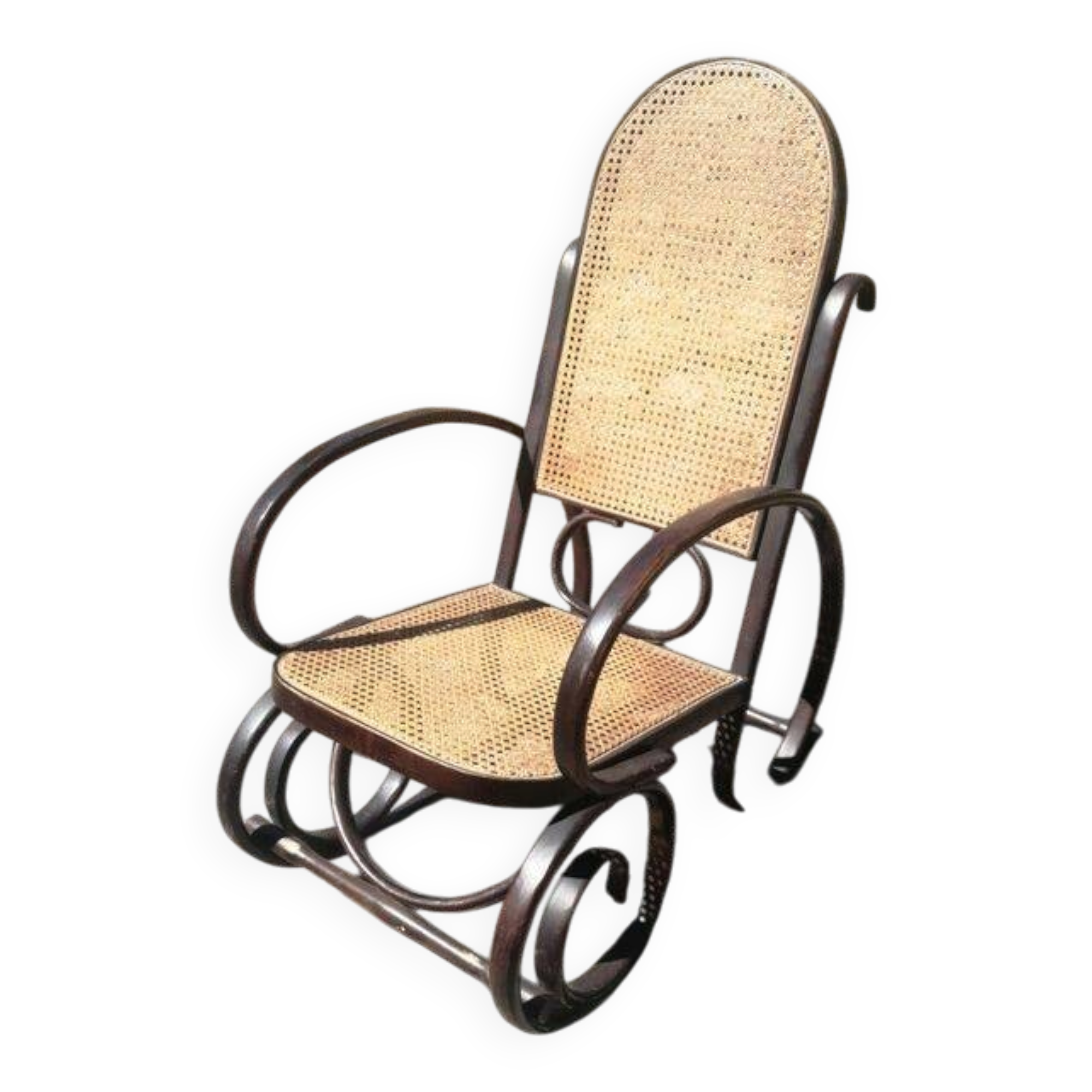 Vintage Thonet rocking chair in cane and bent wood.