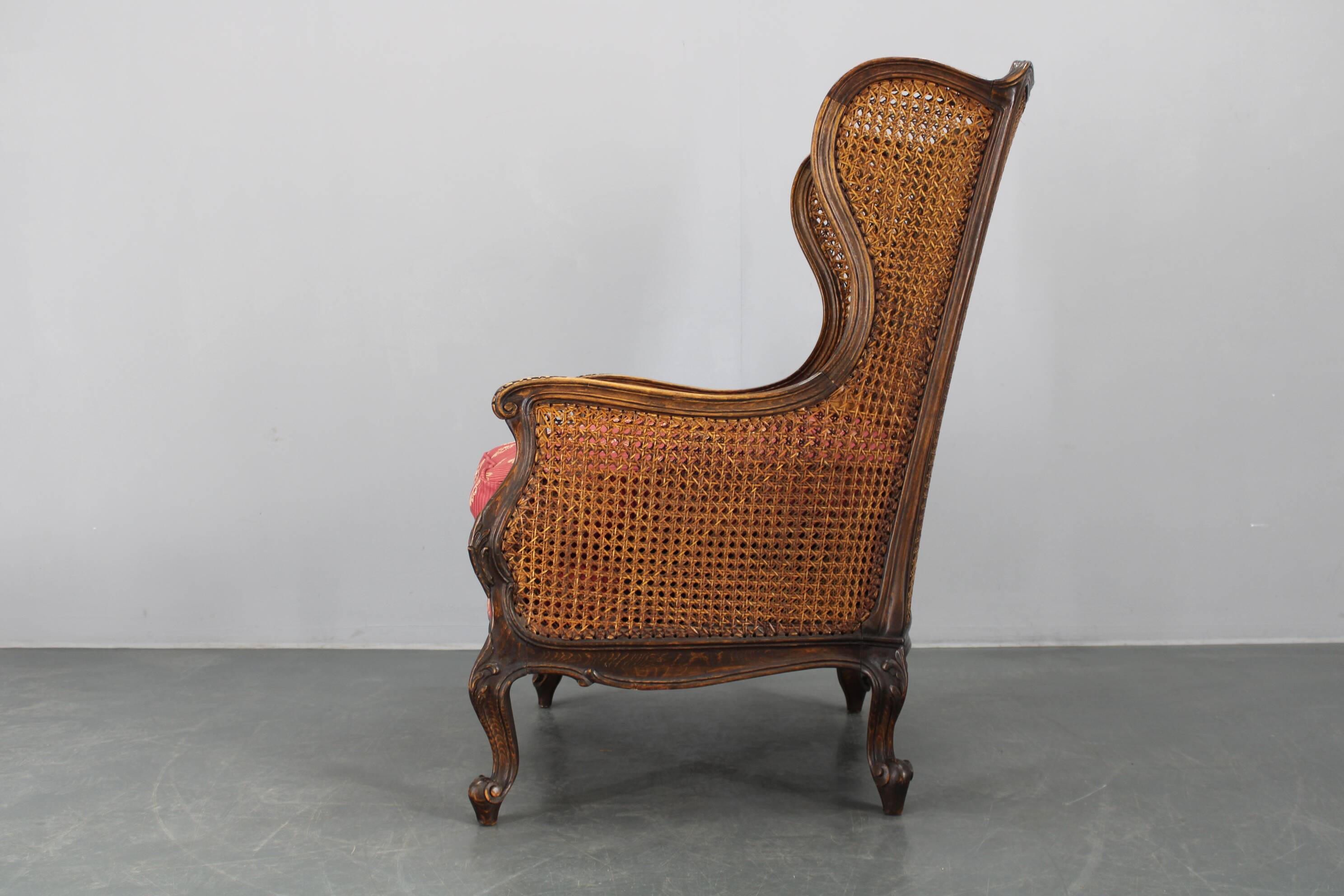 Antique Carved Wing Chair with Cane Sides , Czechoslovakia