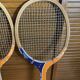 Pair of vintage wooden tennis rackets for cadet junior sport courier