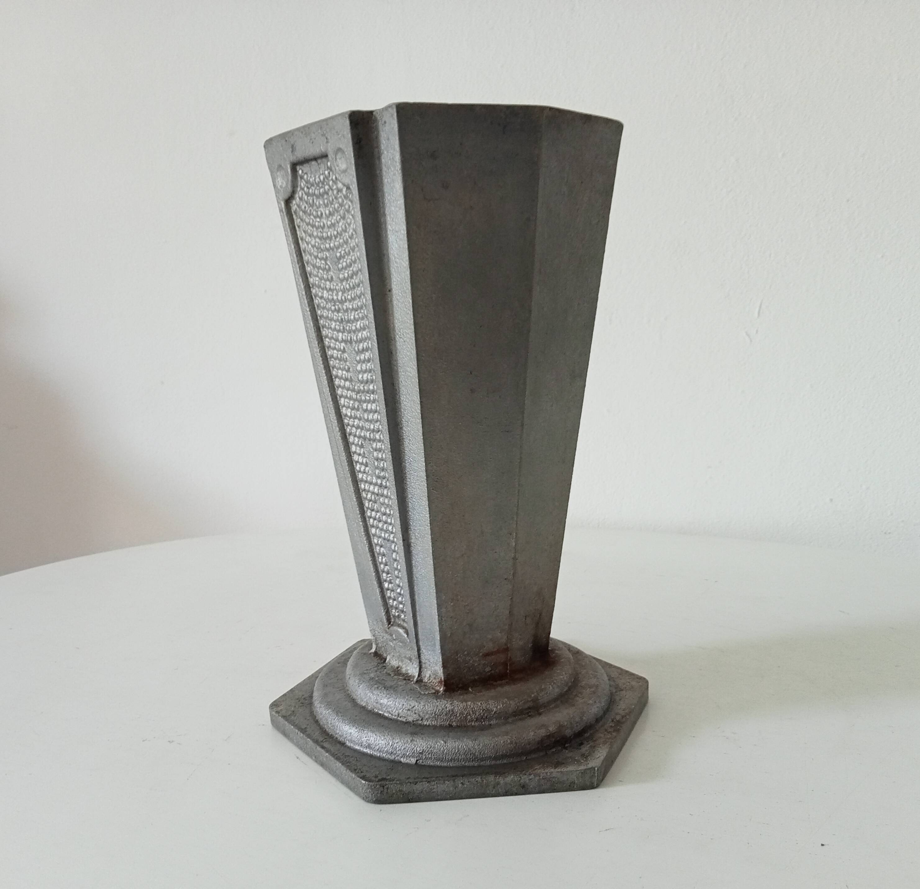 Old art deco vase in cast aluminum