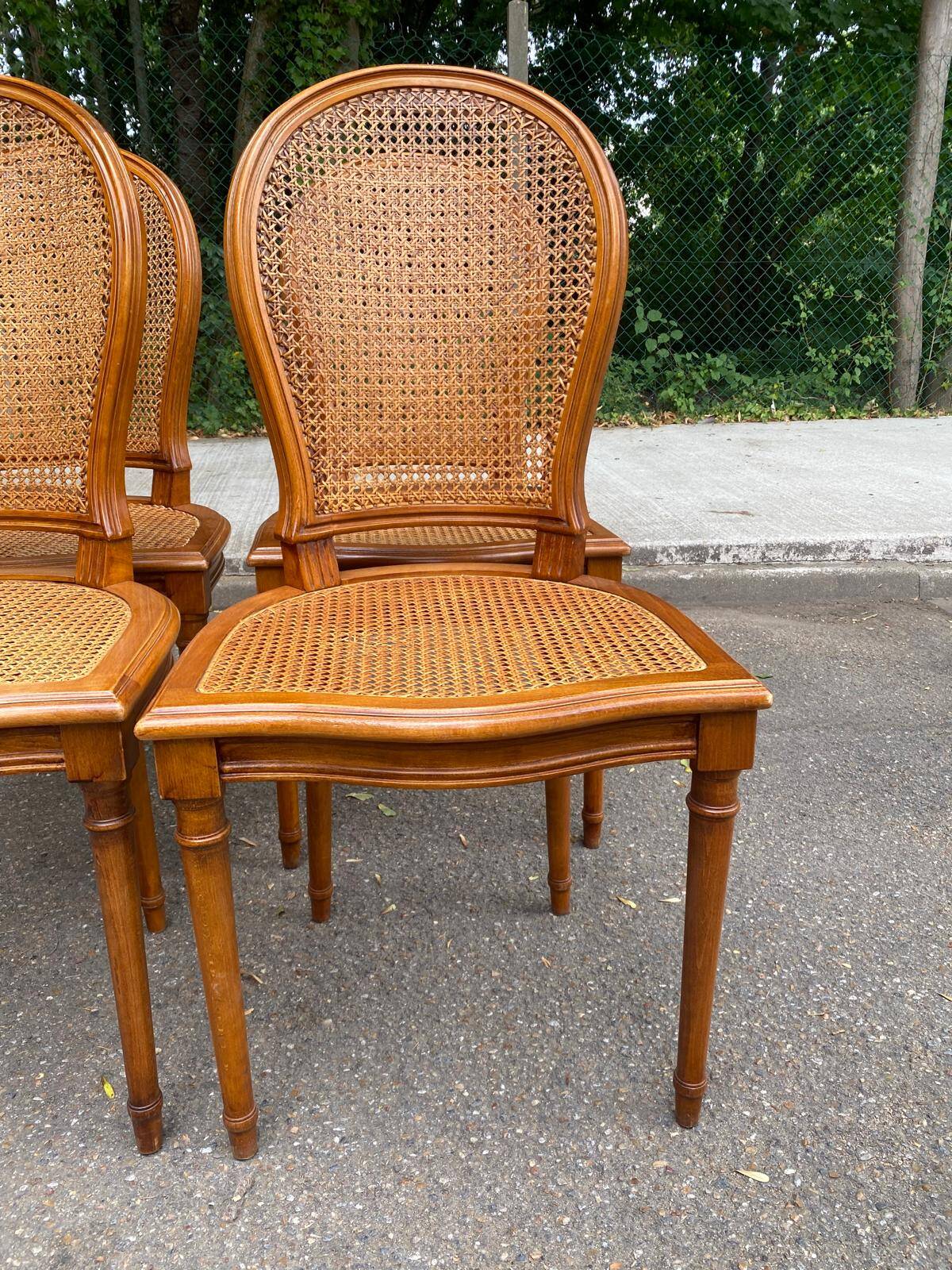 4 caned Louis XVI medallion dining chairs from the 1960s.