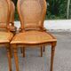4 caned Louis XVI medallion dining chairs from the 1960s.