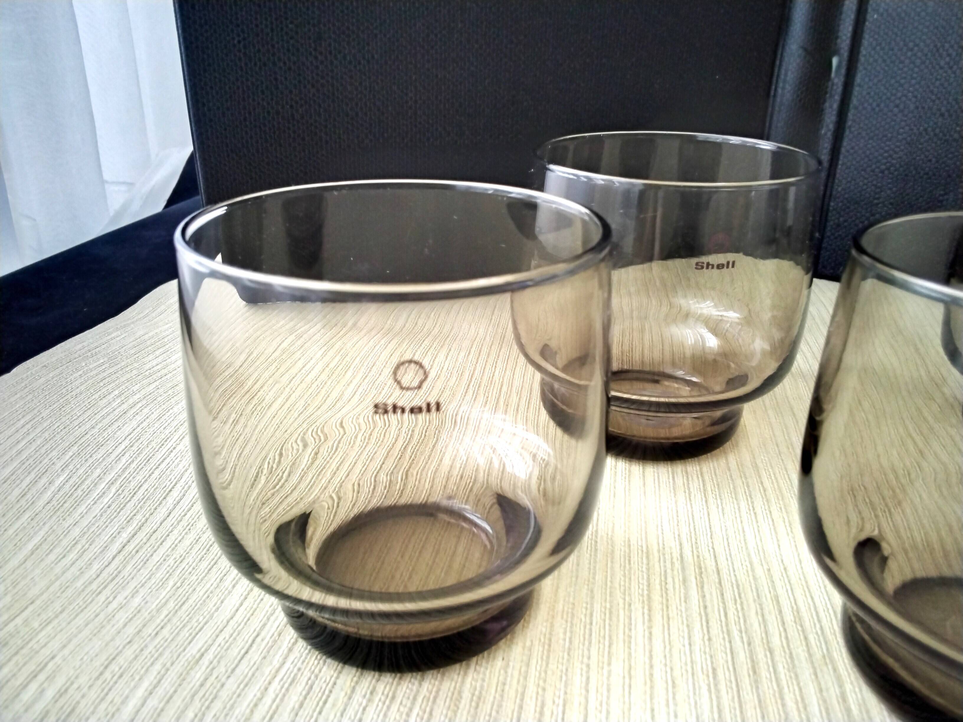 4 vintage shell smoked glass glasses