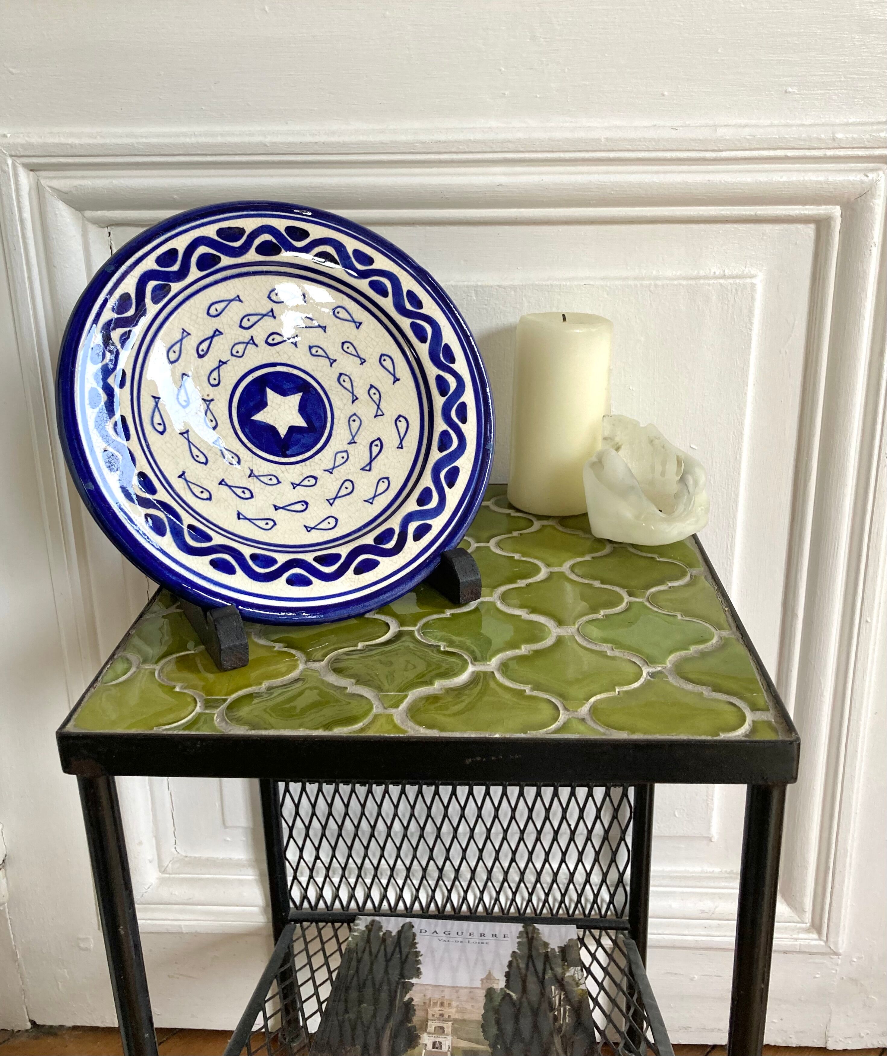 Decorative ceramic deep plate with fish decoration