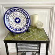 Decorative ceramic deep plate with fish decoration