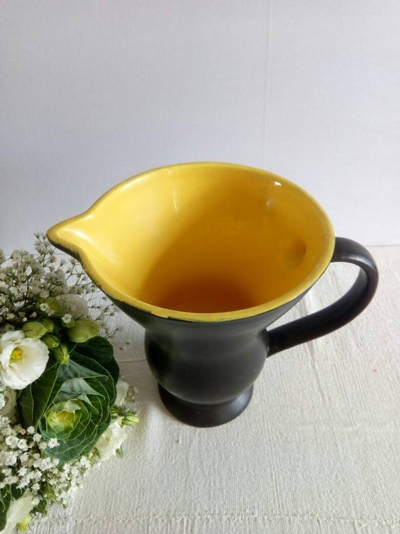 Old black and yellow black and yellow Digoin earthenware pitcher or pitcher