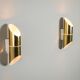 Pair of cylindrical wall lamps in brass with perforated shades