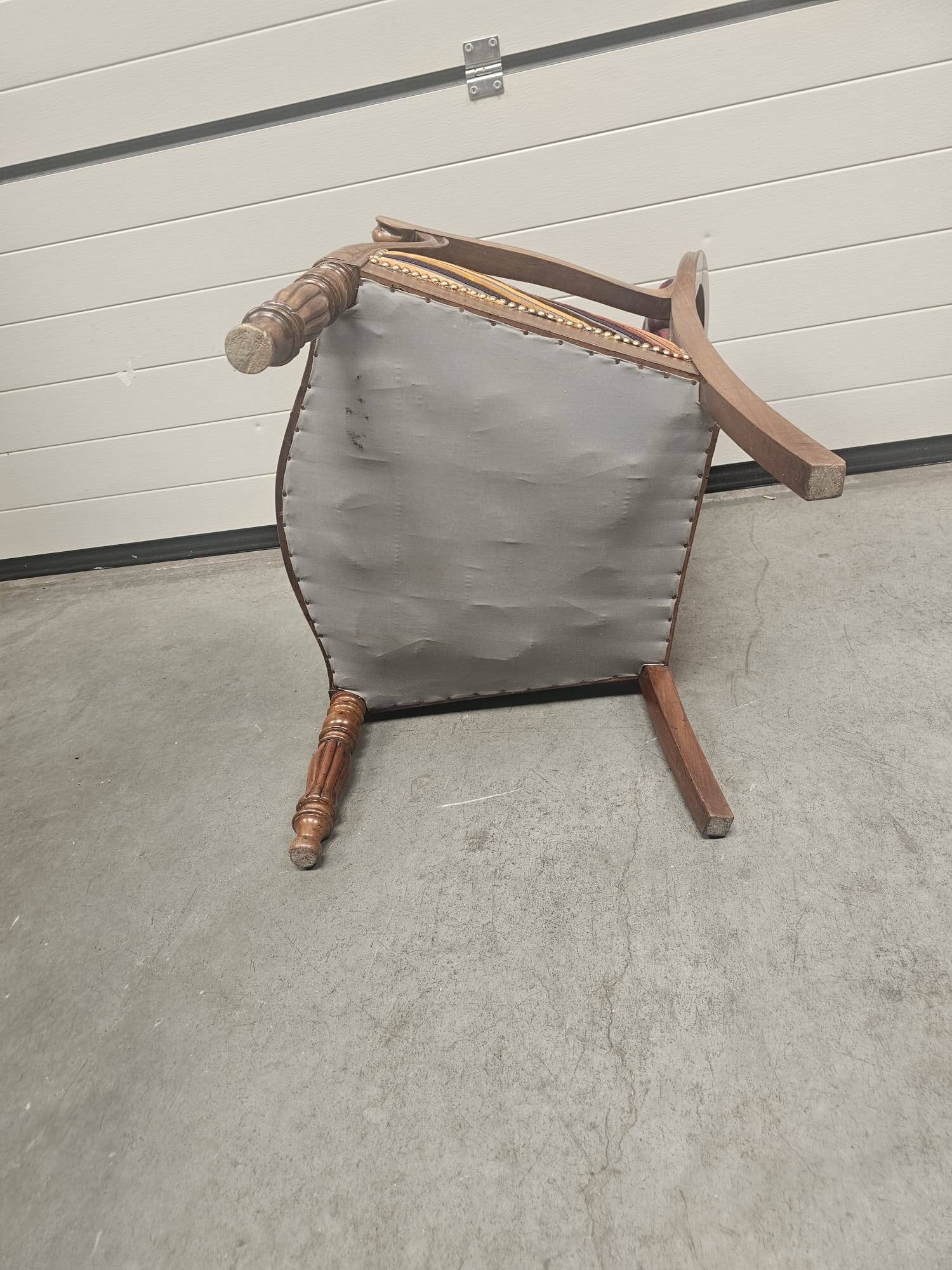 Antique armchair in multi-colored striped velvet with turned legs