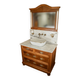 Antique washbasin cabinet from 1928 in wood and marble with a lighted mirror.