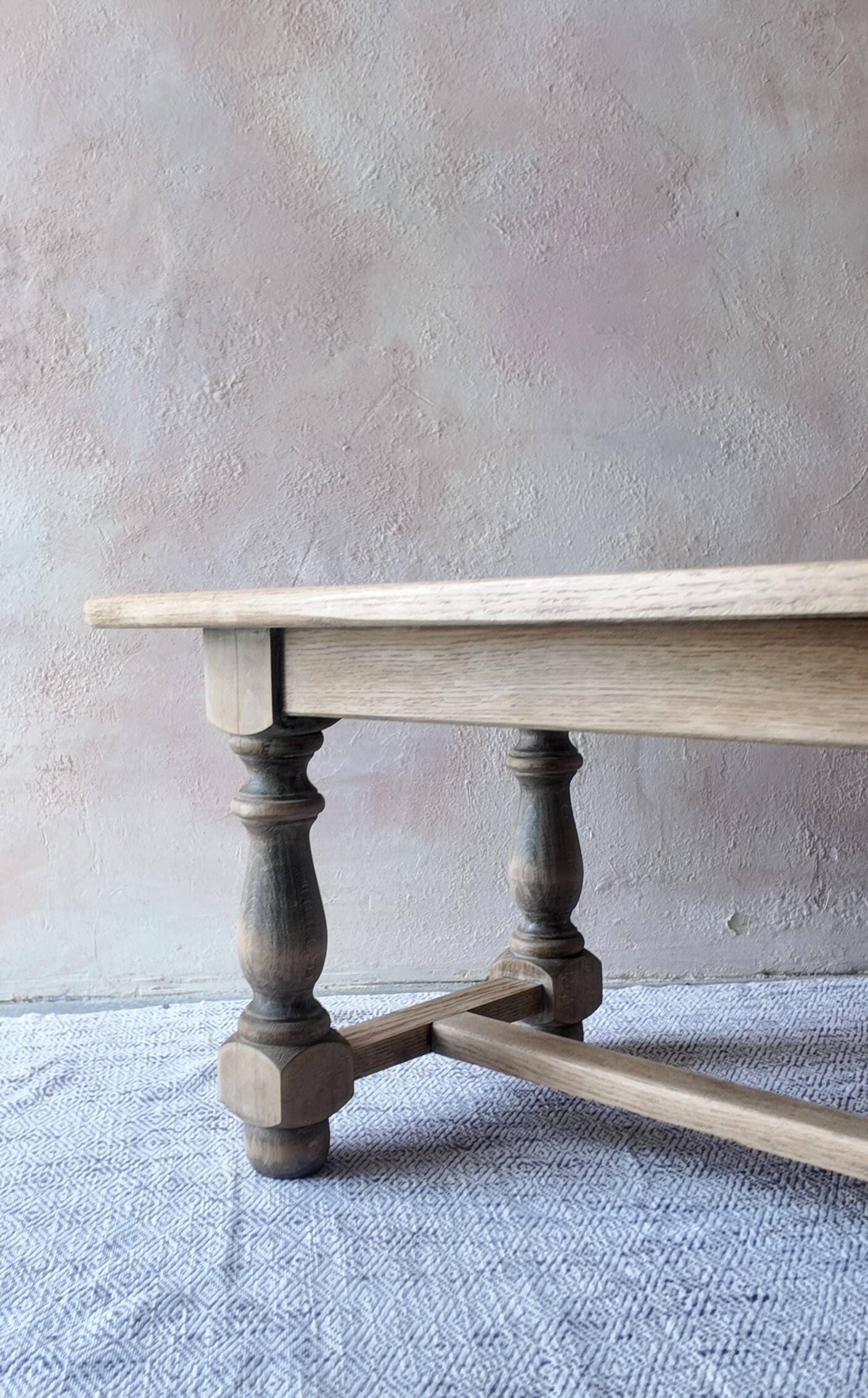 Old farmhouse coffee table in solid oak - turned legs and stretcher.