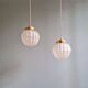 Pair of Art Deco pendant lights in pressed molded satin glass, 1920-30