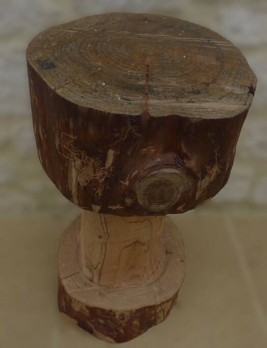 Large carved stool in solid oak