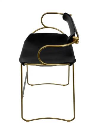 Bar stool with a vintage brass backrest and black leather.