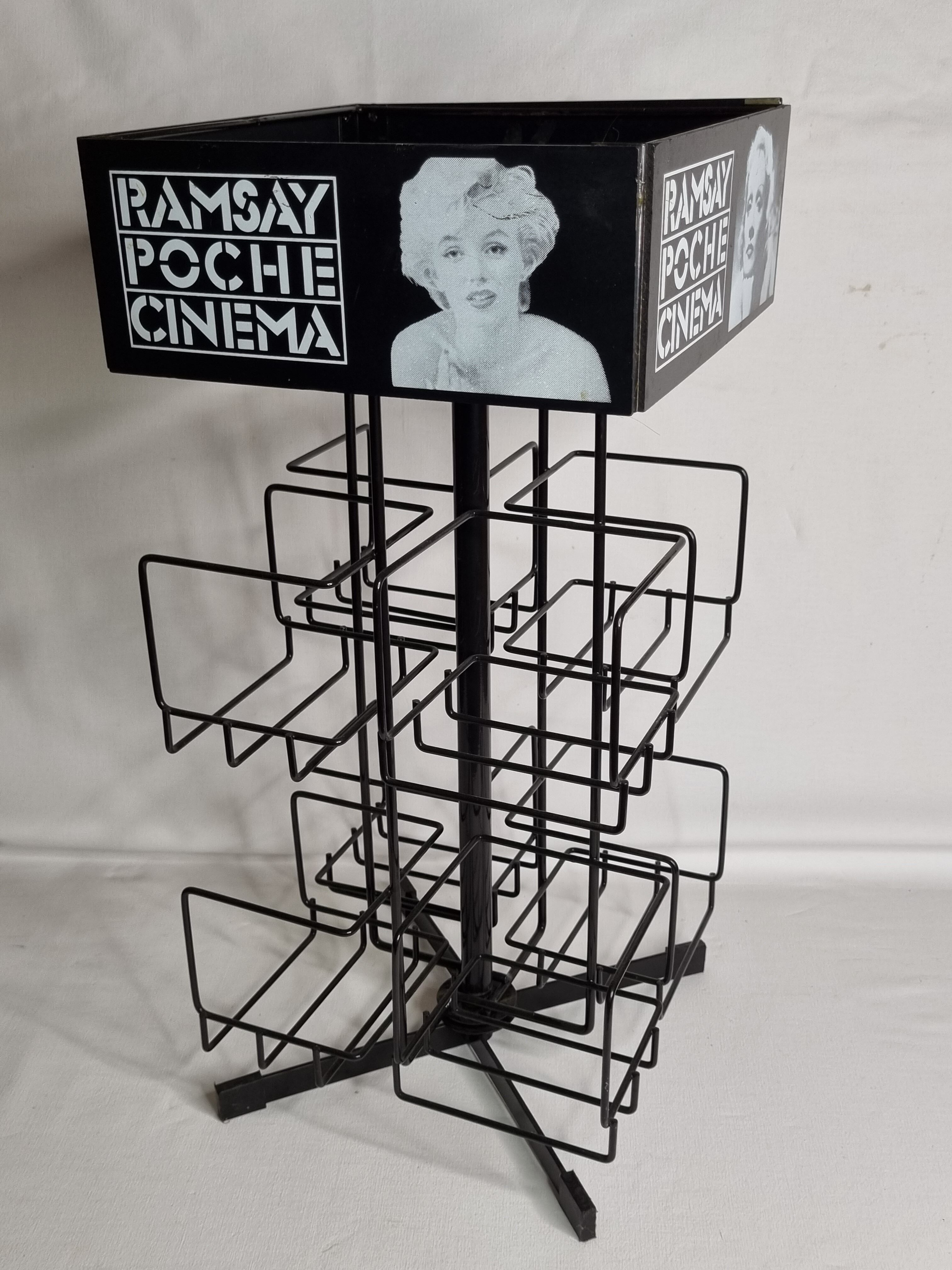 Vintage rotating bookcase for paperbacks in black lacquered metal, 58 cm