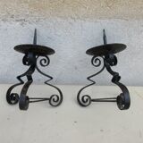 Pair of iron candlesticks