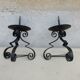 Pair of iron candlesticks