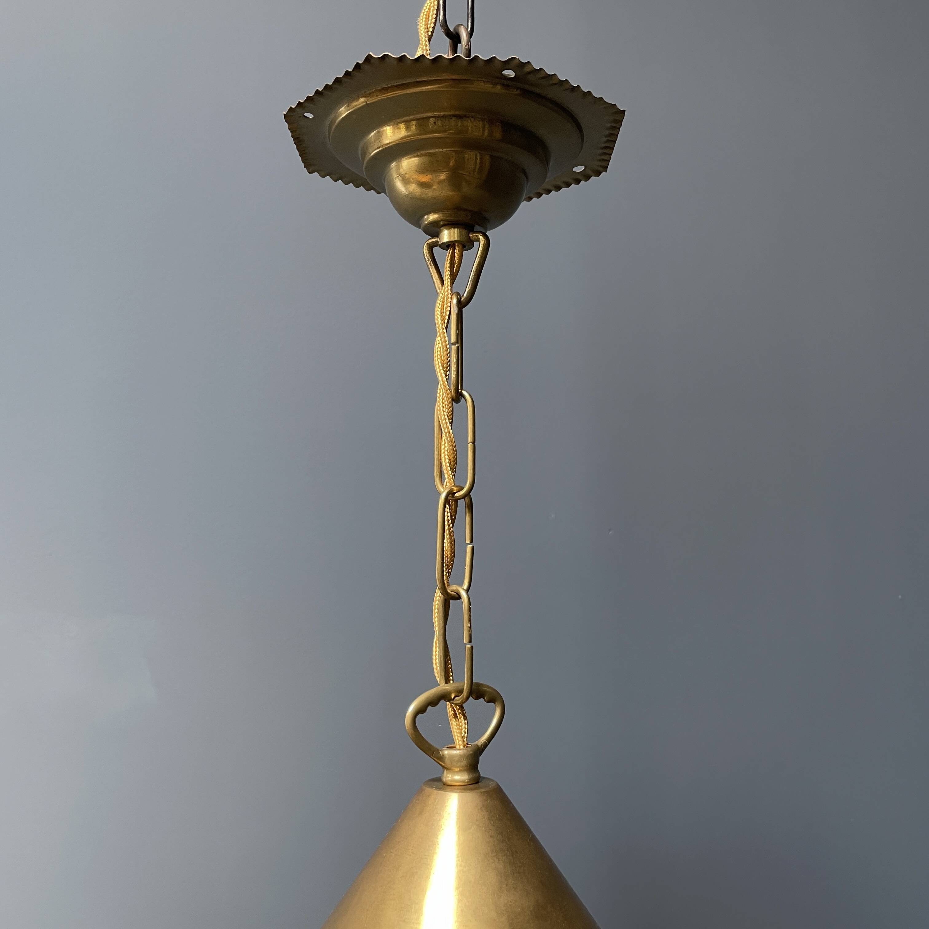 Brass lantern pendant lamp with yellow glass