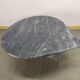 Table basse en marbre gris goute d'eau