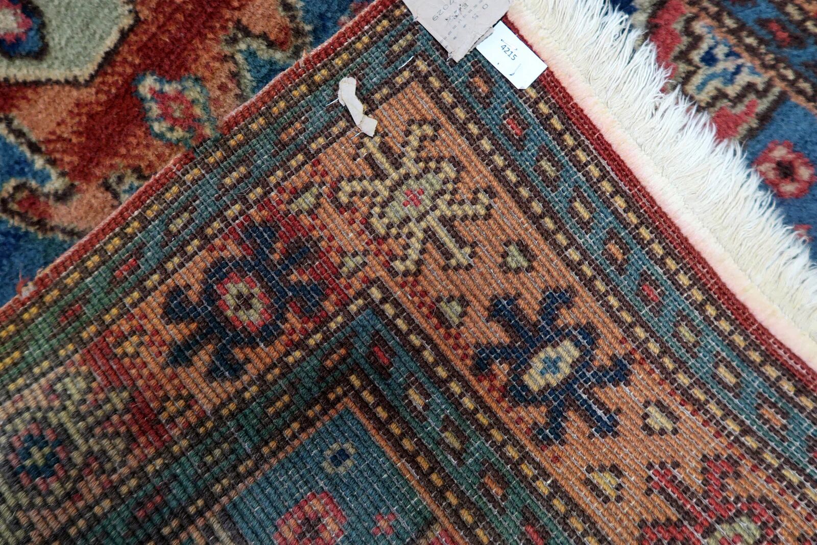 Vintage 1950s German tribal style wool rug, geometric medallion, 84cm x 180cm