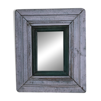 Beveled mirror patinated wood early 20th century