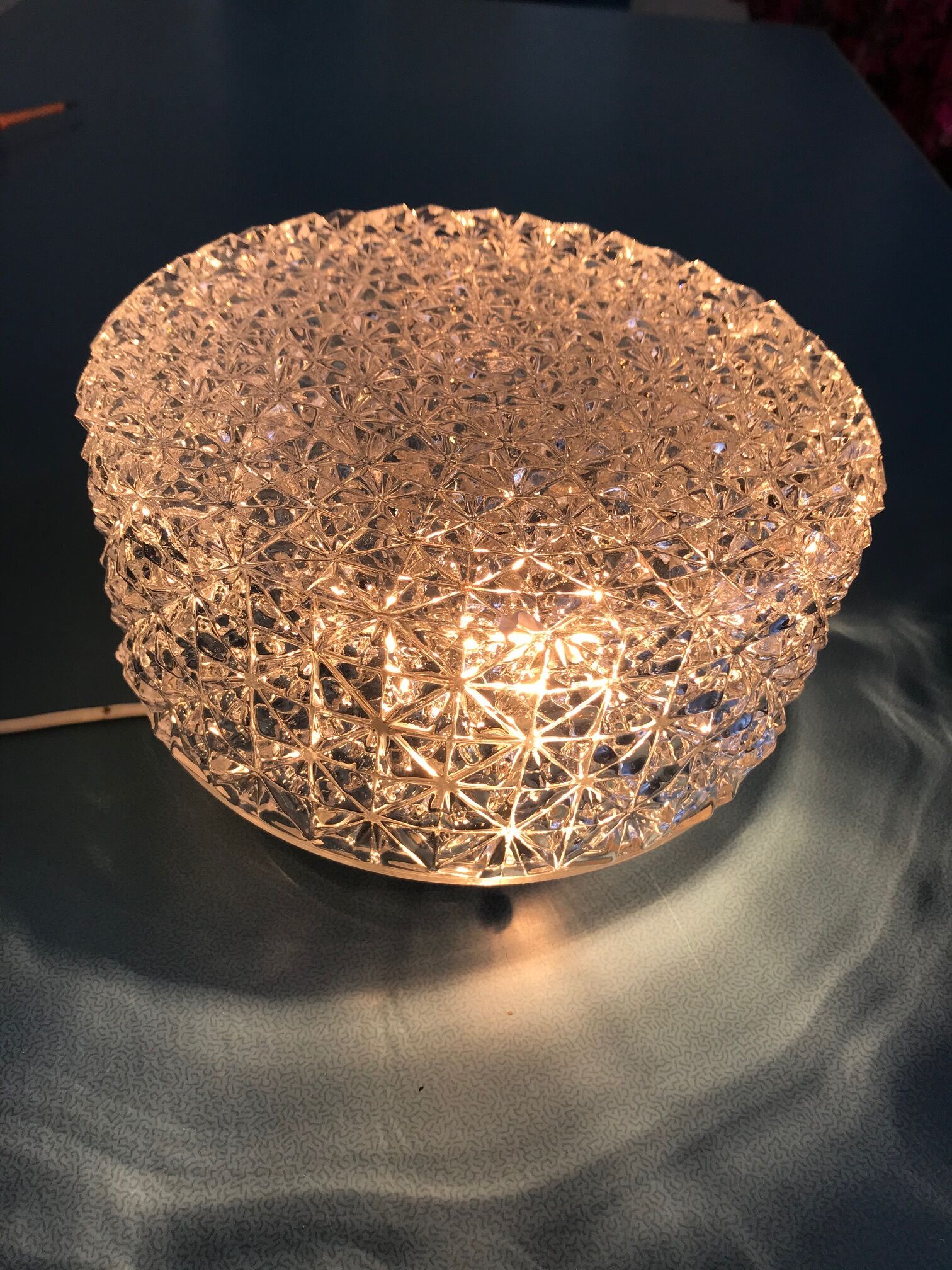Round ceiling light in chiseled glass