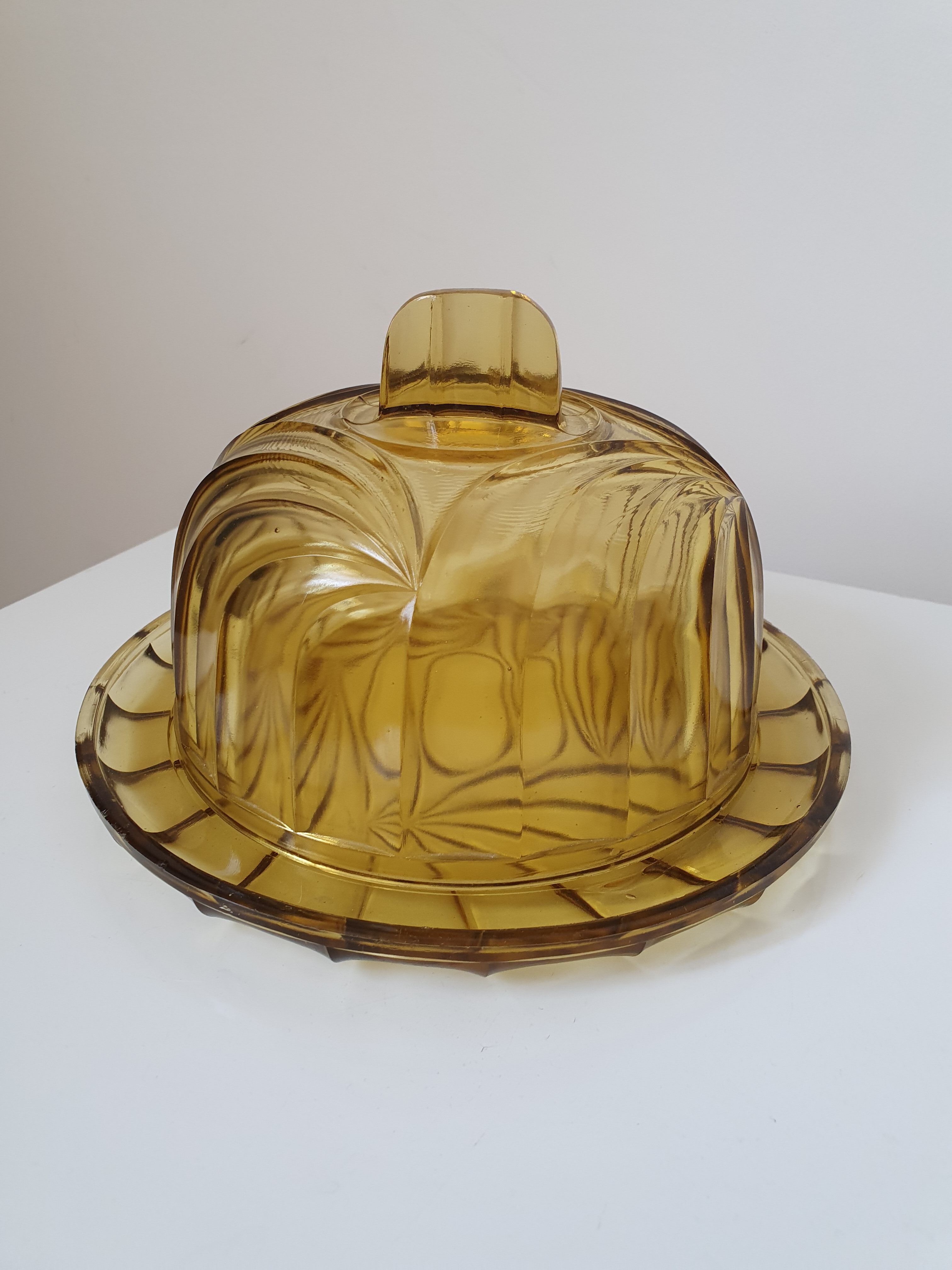 Bell and smoked yellow glass dish