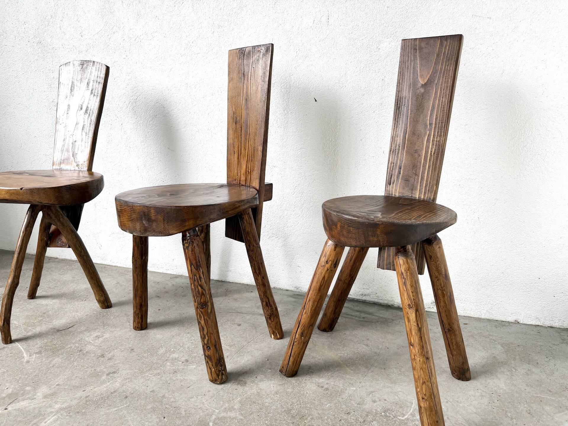 Set of three alpine chairs in solid pine, France, 1950s.