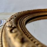 Small vintage wall mirror in gold painted wood