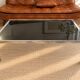 Vintage coffee table in chrome and smoked glass – 1970s/80s