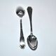 Ercuis set of 2 Trianon silver-plated dessert spoons with crossed ribbon, 15 cm