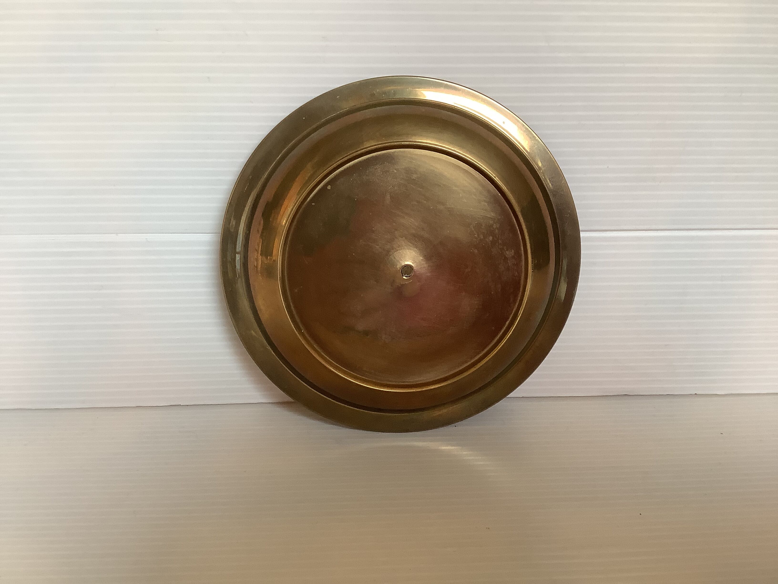 Brass candle pique
