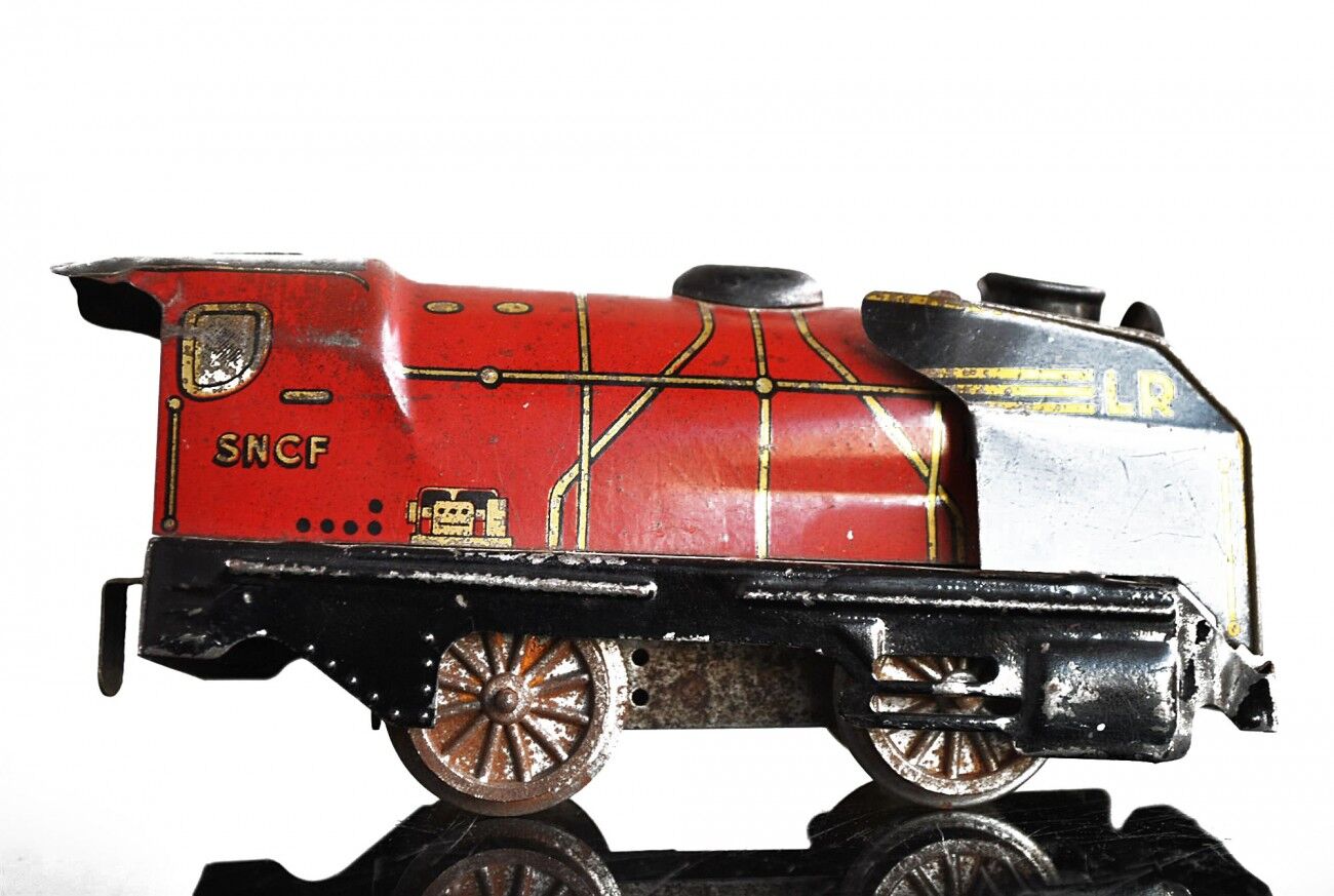 Tin litho brand LR spring-loaded toy locomotive