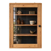 Antique wall display cabinet in natural wood and black – small glass-fronted collector's piece.