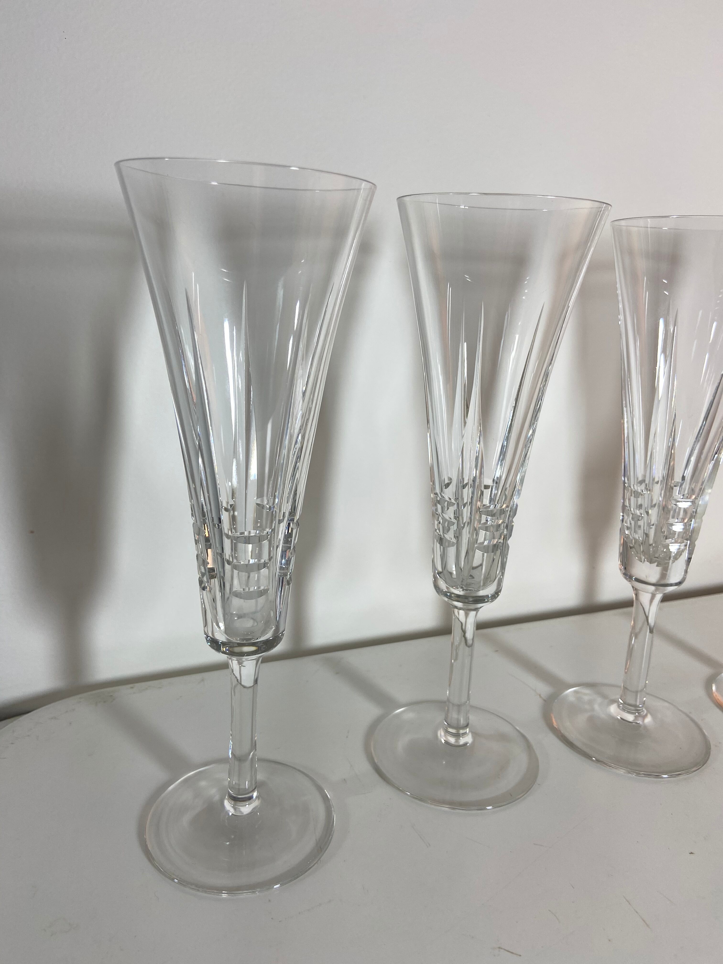 Series of 4 vintage crystal champagne flutes