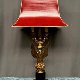 Large lamp with a bronze eagle figure.