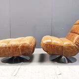 Vintage leather swivel chair with stool, 1970s