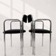 Vintage chairs with double chrome structure and black velvet. 70s