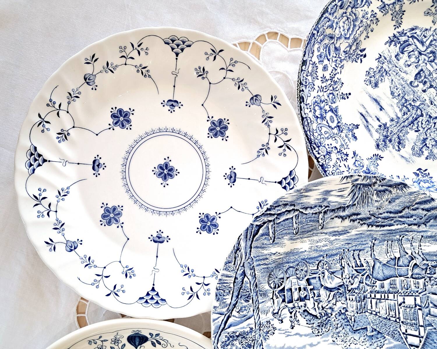 Mismatched antique dinner plates