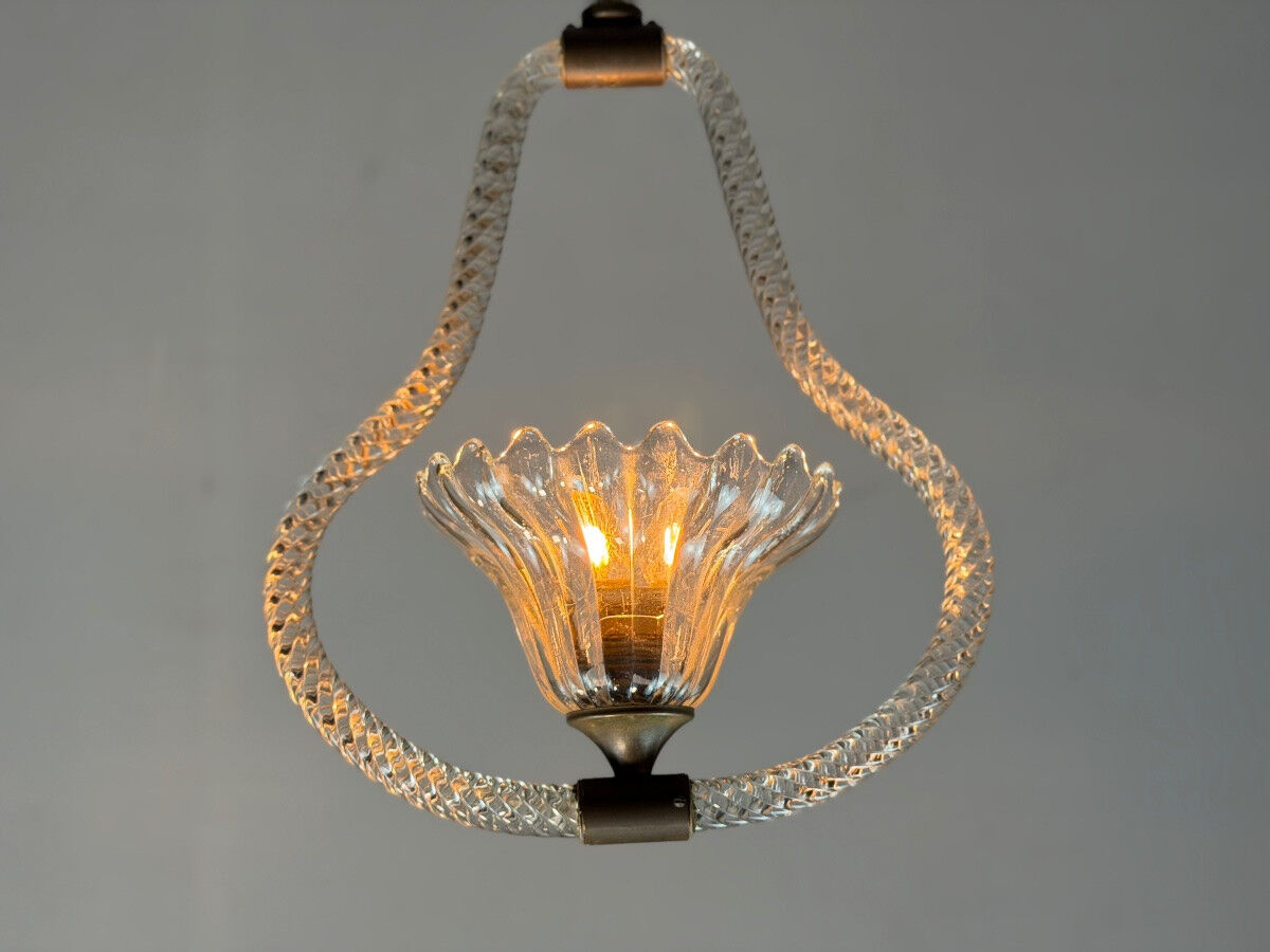 Venetian chandelier in colourless Murano glass and brass, circa 1950.