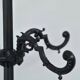 Large ornate cast iron hall tree coat stand with 12 hooks