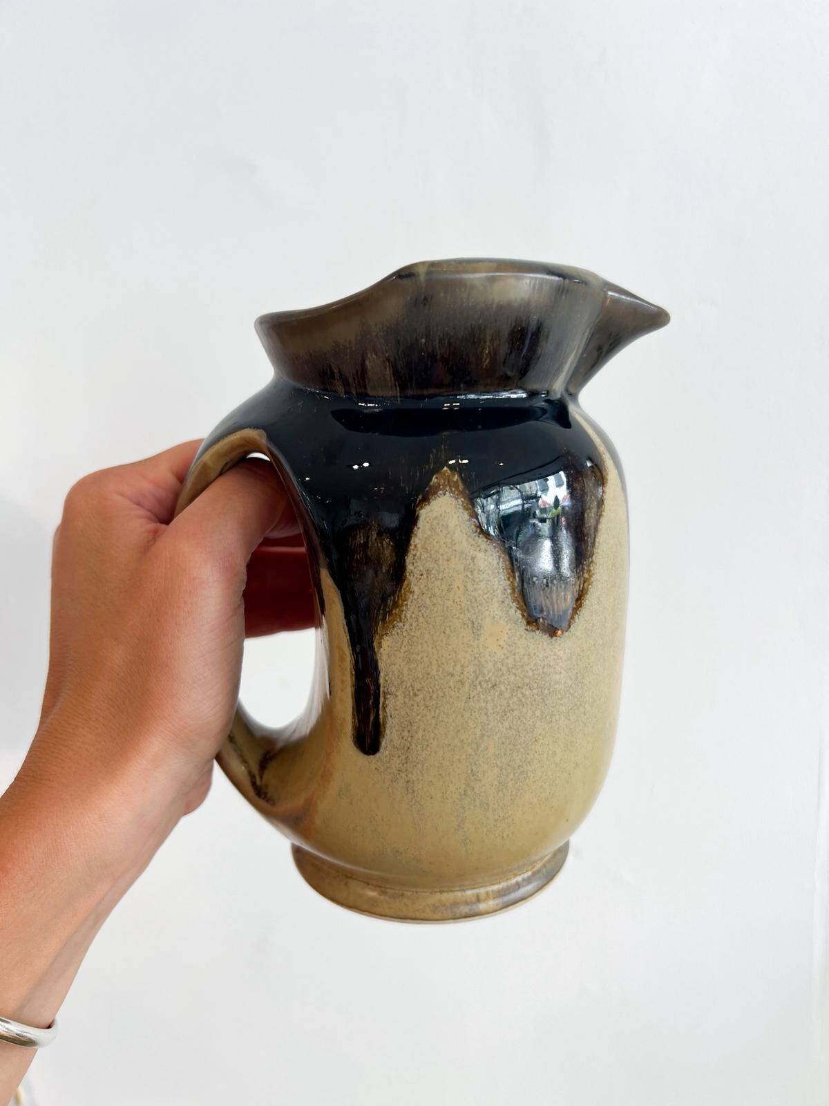 Antique carafe in flamed enamelled ceramic