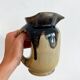 Antique carafe in flamed enamelled ceramic