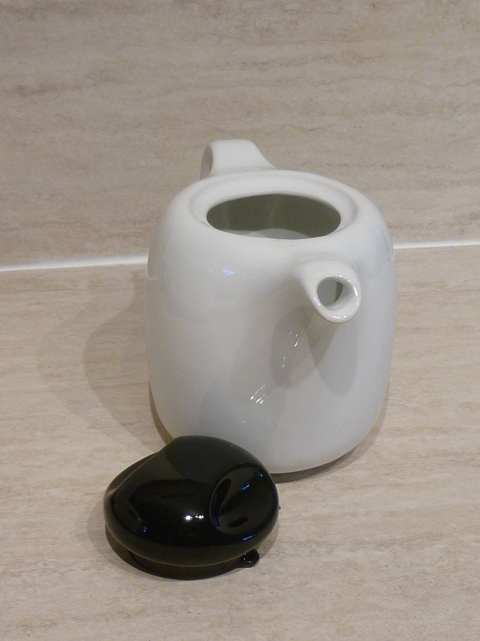 Black and white ceramic coffee maker