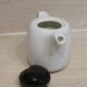 Black and white ceramic coffee maker