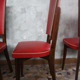Lot of 8 vintage wooden chairs and red skai